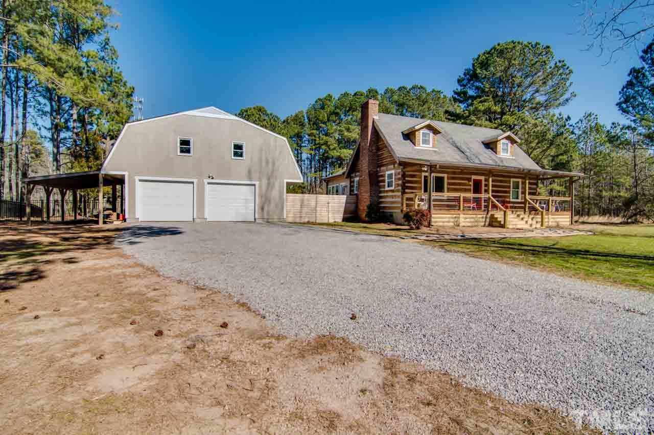 2704 Mt Vernon Church Road Raleigh, NC 27613 - Photo 19 of 23 a front view of a house with a yard