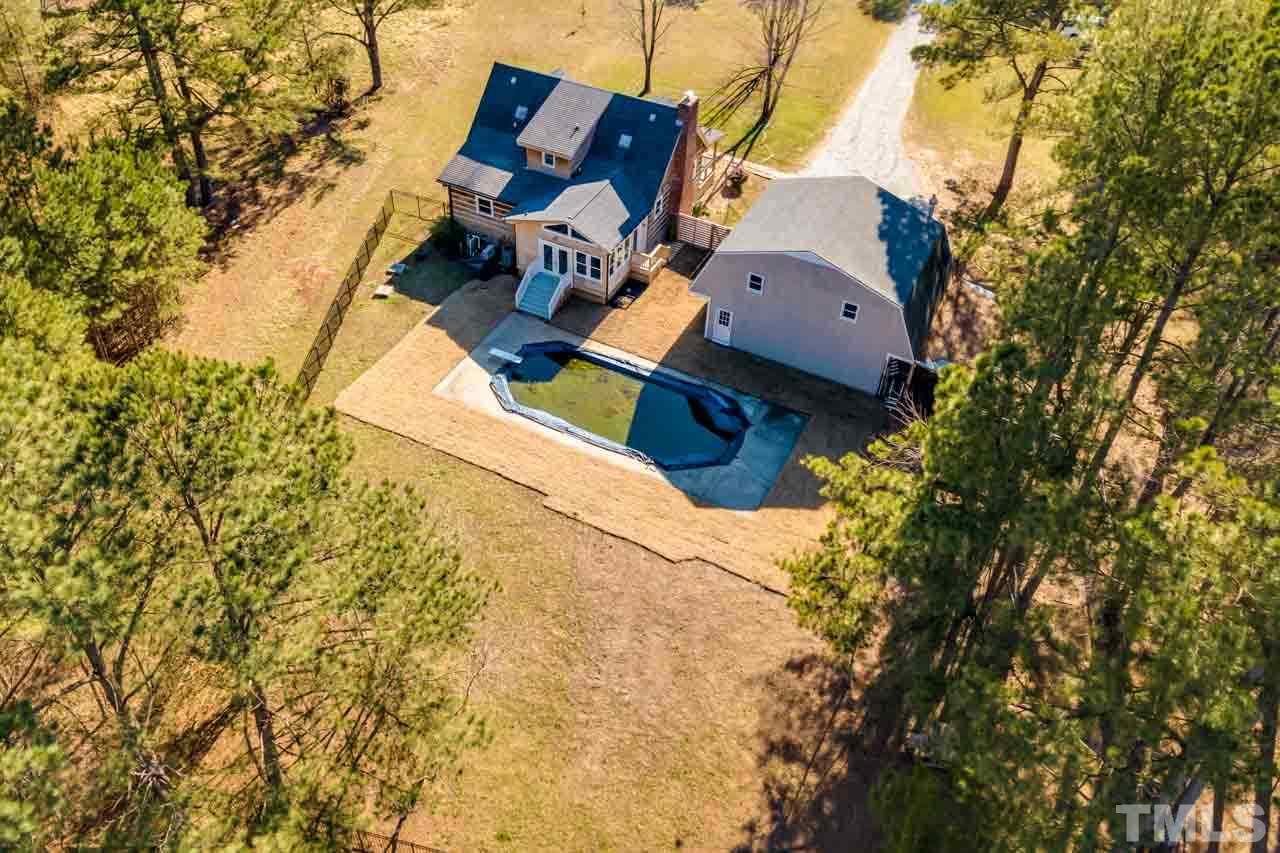 2704 Mt Vernon Church Road Raleigh, NC 27613 - Photo 22 of 23 an aerial view of a house with pool and garden