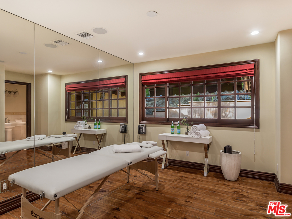 5839 Jed Smith Road Hidden Hills, CA 91302 - Photo 19 of 36 a living room with furniture and window