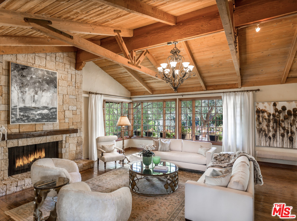 5839 Jed Smith Road Hidden Hills, CA 91302 - Photo 8 of 36 a living room with furniture and a fireplace