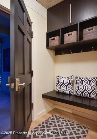 a view of a door and car parked