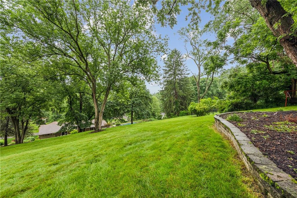 118 Conewanta Road Pittsburgh, PA 15241 - Photo 13 of 48 a view of a grassy field with trees