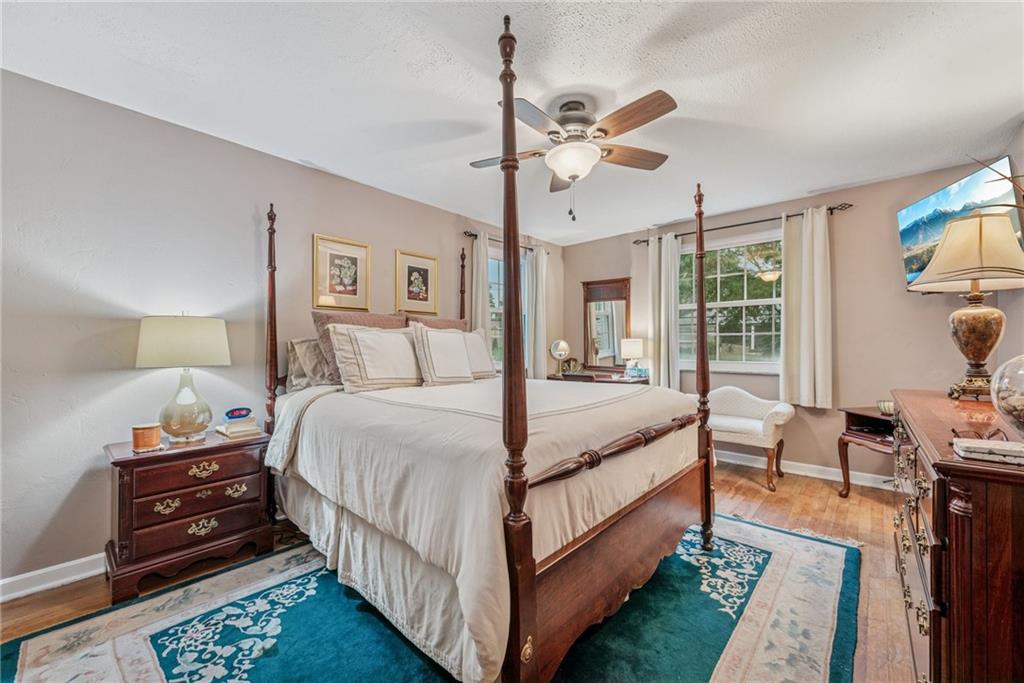 118 Conewanta Road Pittsburgh, PA 15241 - Photo 30 of 48 a bed room with a bed and a chandelier