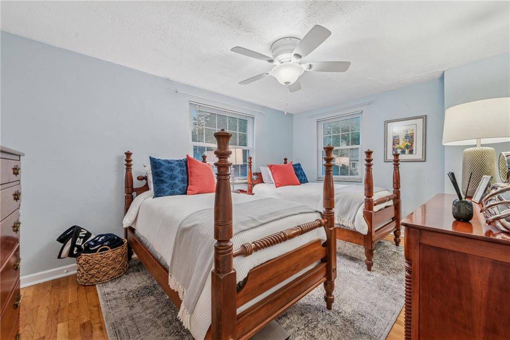 118 Conewanta Road Pittsburgh, PA 15241 - Photo 35 of 48 a bed room with a bed and a chandelier