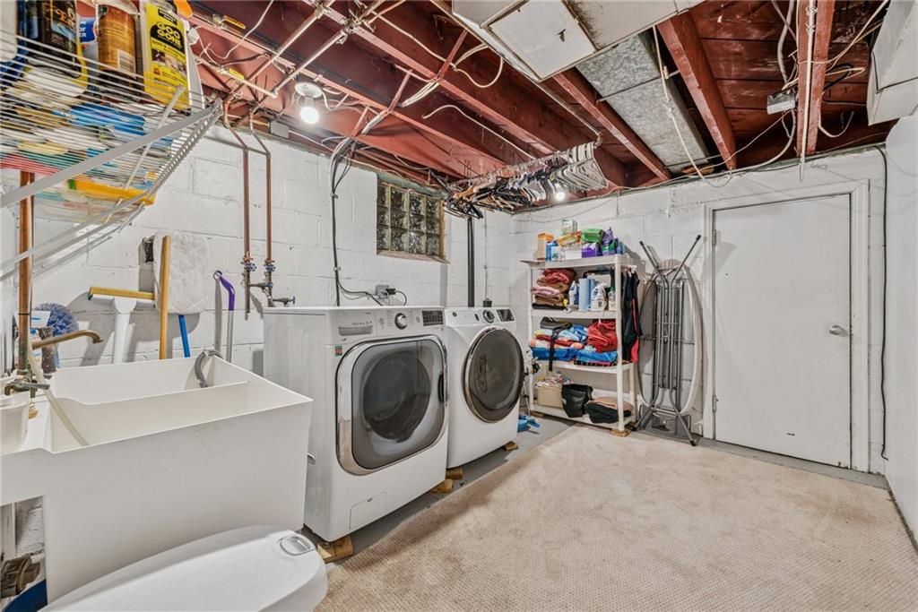 118 Conewanta Road Pittsburgh, PA 15241 - Photo 45 of 48 a utility room with dryer and washer