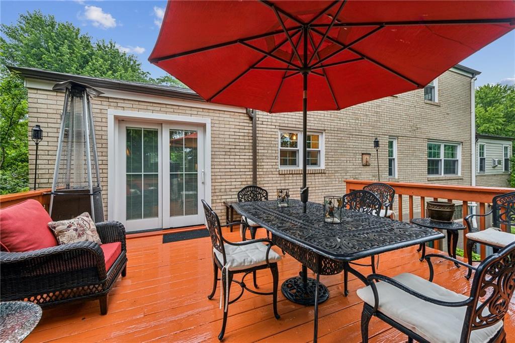 118 Conewanta Road Pittsburgh, PA 15241 - Photo 5 of 48 a backyard of a house with barbeque oven table and chairs