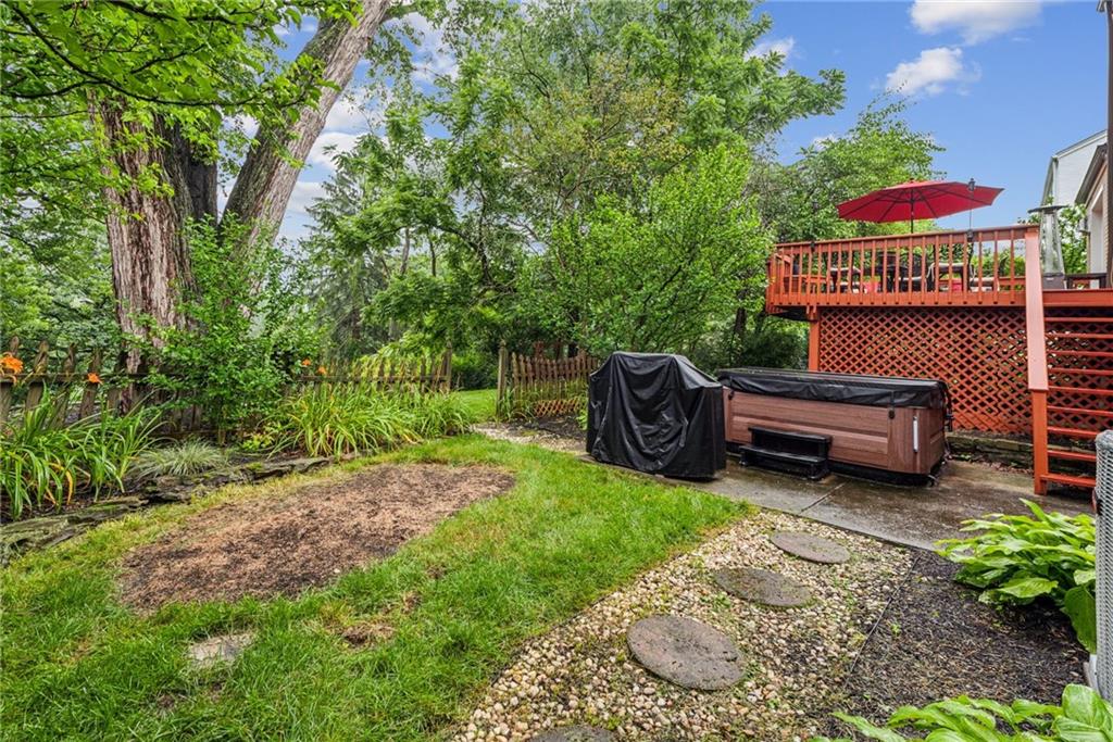 118 Conewanta Road Pittsburgh, PA 15241 - Photo 10 of 48 a view of a backyard with table and chairs and potted plants