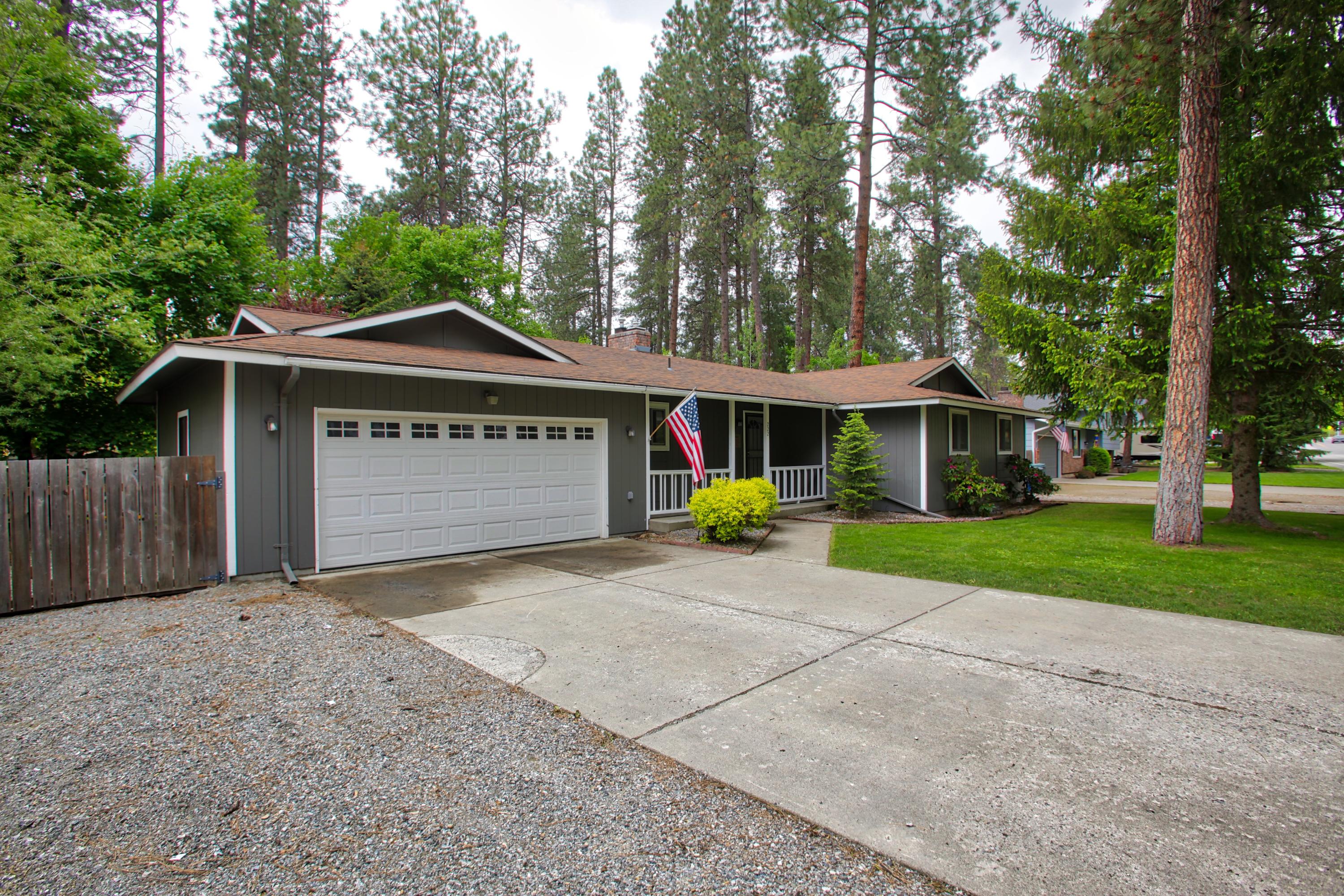 222 South Ross Point Road Post Falls, ID 83854 - Photo 1 of 1 Front parking