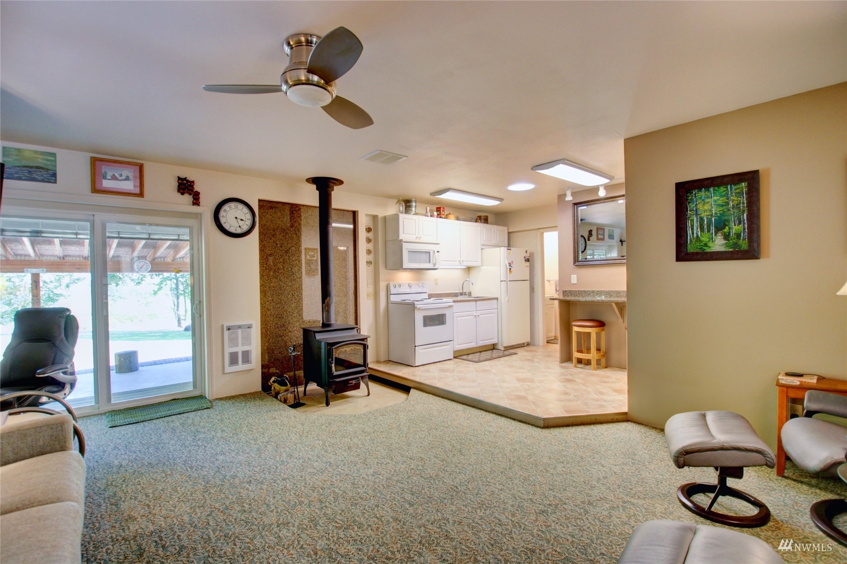 3410 Slater Road Ferndale, WA 98248 - Photo 6 of 30 a living room with furniture gym equipment and large window