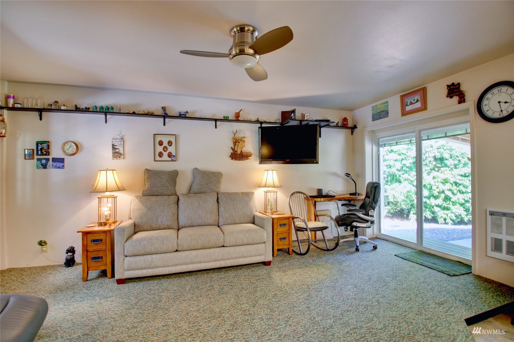 3410 Slater Road Ferndale, WA 98248 - Photo 8 of 30 a living room with furniture and a flat screen tv