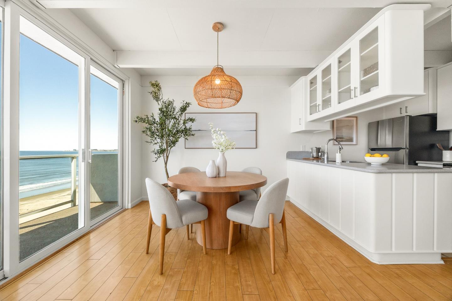 230 Rio Del Mar Boulevard, Unit K Aptos, CA 95003 - Photo 7 of 29 a view of a dining room with furniture window and wooden floor