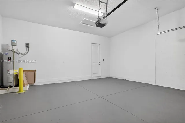 a kitchen with stainless steel appliances a refrigerator and a sink