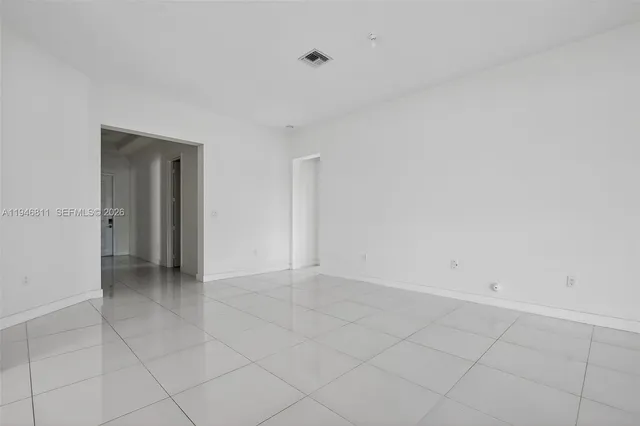 a kitchen with a stove and a microwave
