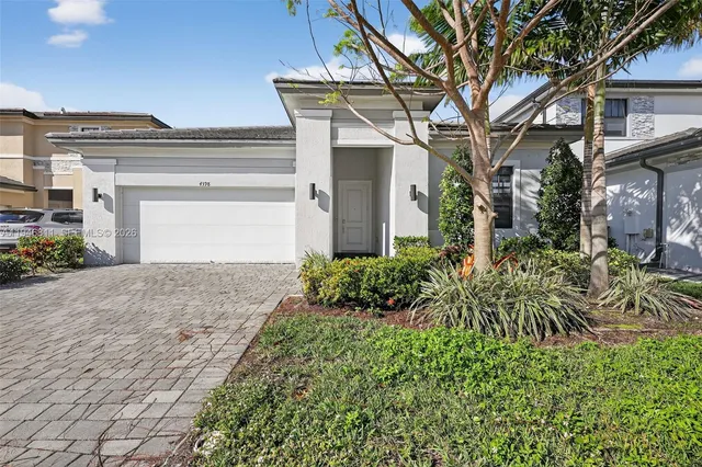 front view of a house with a small yard