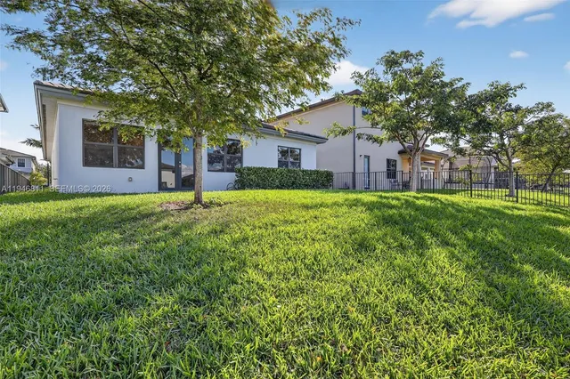 a spacious bathroom with a bathtub and a shower