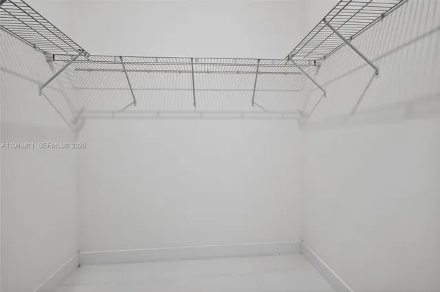 a bathroom with a shower and a toilet