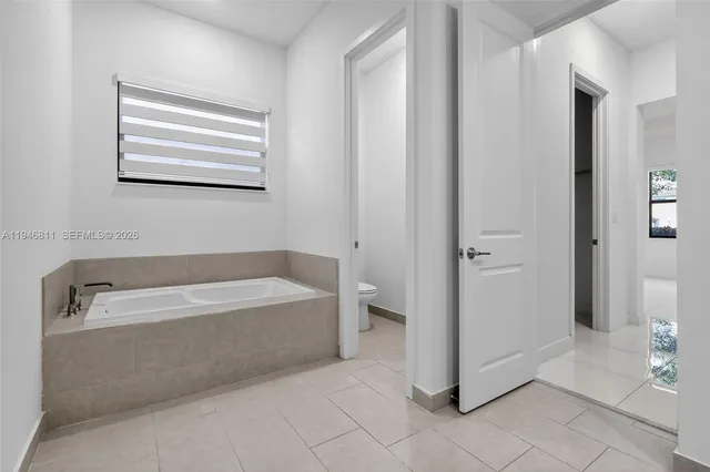 an aerial view of a city with houses