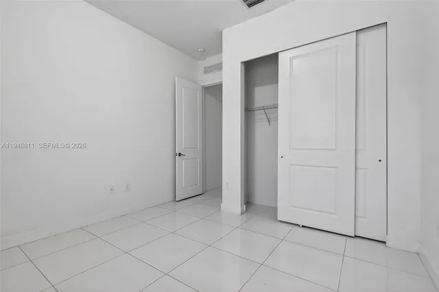 a bathroom with a toilet a sink and bathtub