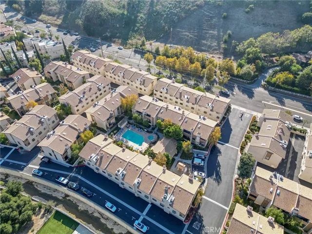a view of multiple houses with yard
