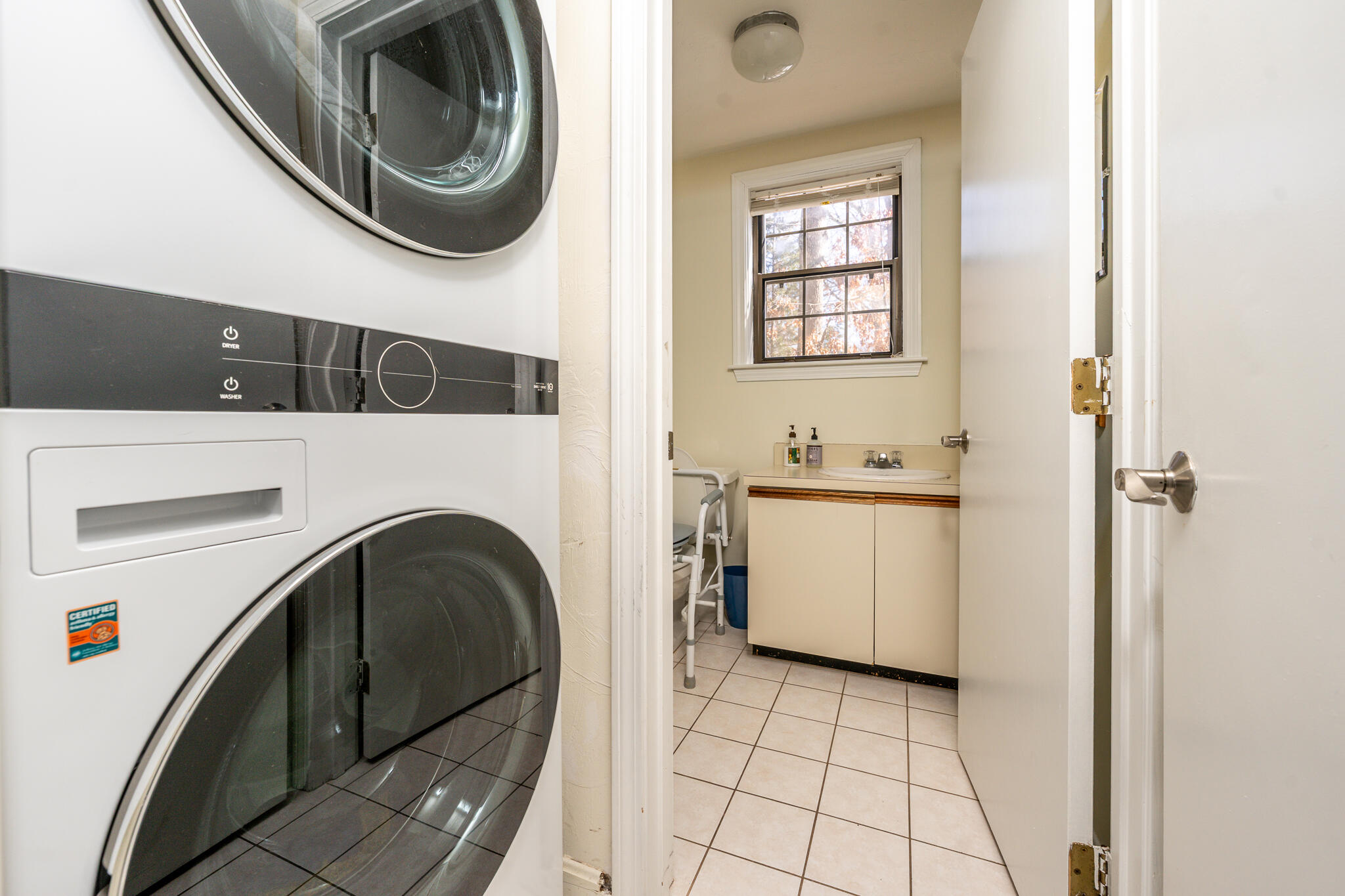 195 Falmouth Road, Unit 9F Mashpee, MA 02649 - Photo 17 of 35 a utility room with dryer and washer