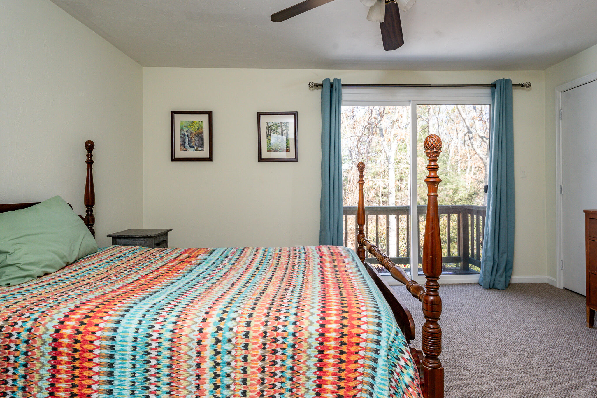 195 Falmouth Road, Unit 9F Mashpee, MA 02649 - Photo 27 of 35 a bedroom with a bed and a large window