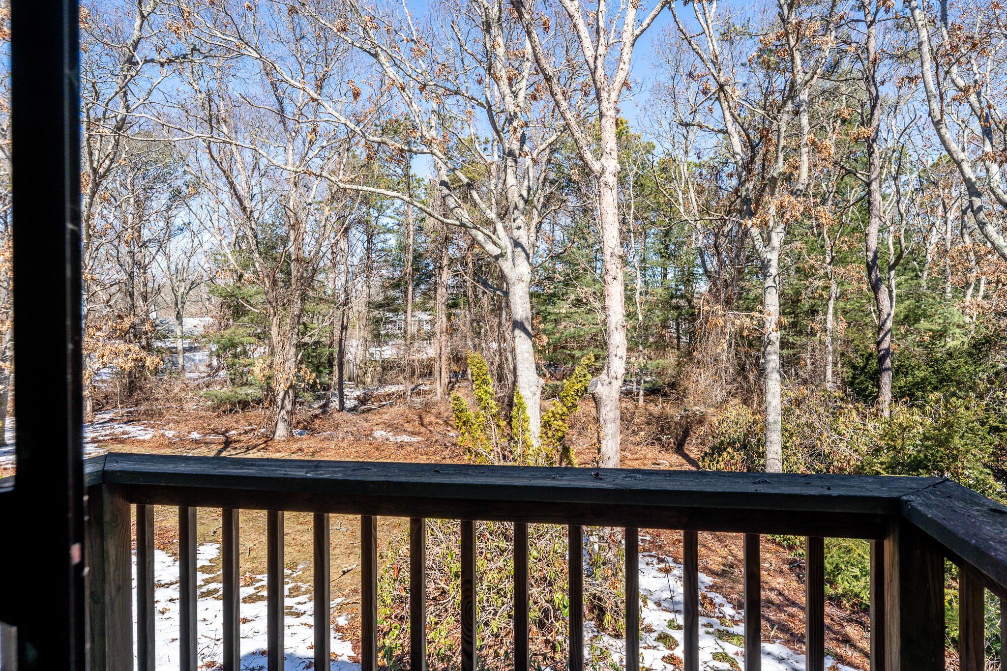 195 Falmouth Road, Unit 9F Mashpee, MA 02649 - Photo 31 of 35 a view of a garden from a balcony