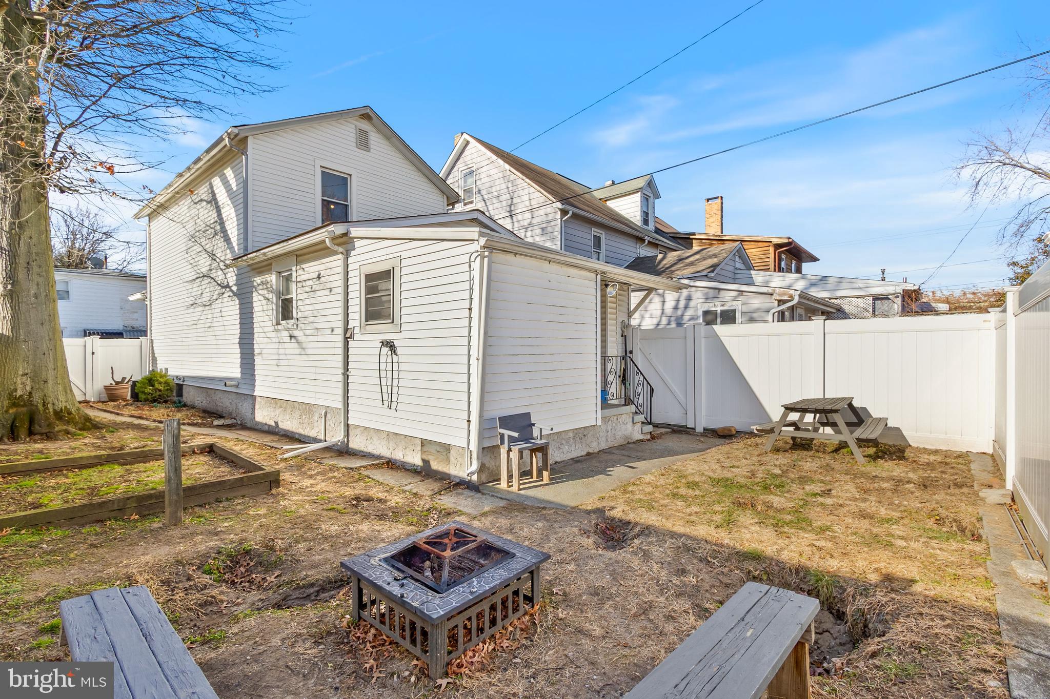111 Thompson Street Burlington, NJ 08016 - Photo 22 of 25 a view of a backyard with table and chairs