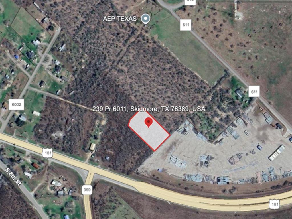 239 Private Road, Unit 6011 Skidmore, TX 78389 - Photo 6 of 6 a view of a wooden bench