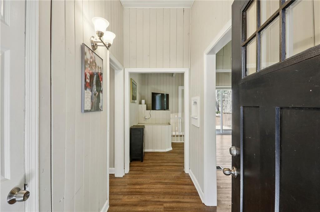 1291 Richard Road Decatur, GA 30032 - Photo 4 of 16 a view of a hallway with wooden floor and staircase