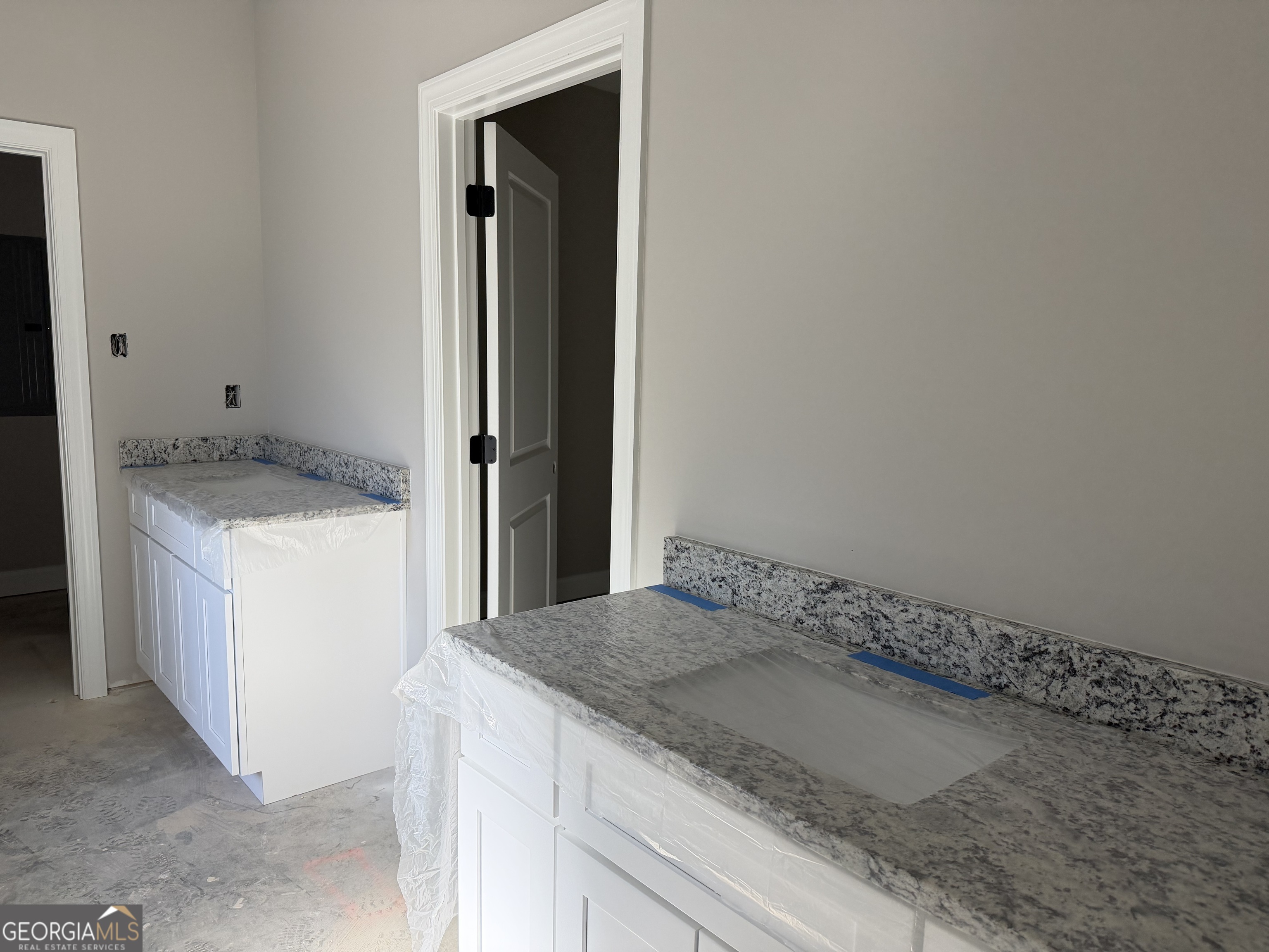 0 Flanders Court Dublin, GA 31021 - Photo 12 of 17 a bathroom with a granite countertop sink and vanity