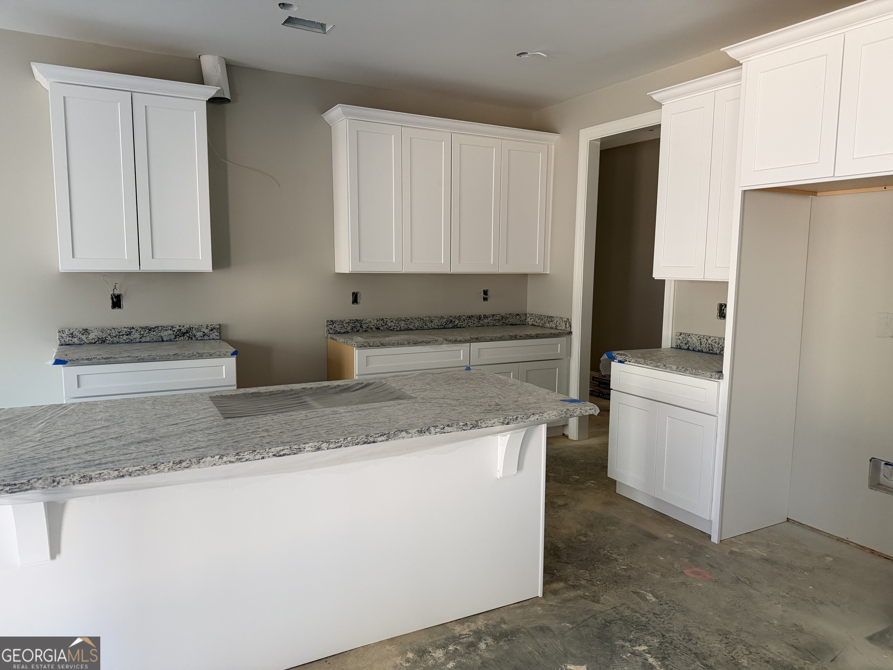 0 Flanders Court Dublin, GA 31021 - Photo 8 of 17 a kitchen with a sink stove and refrigerator