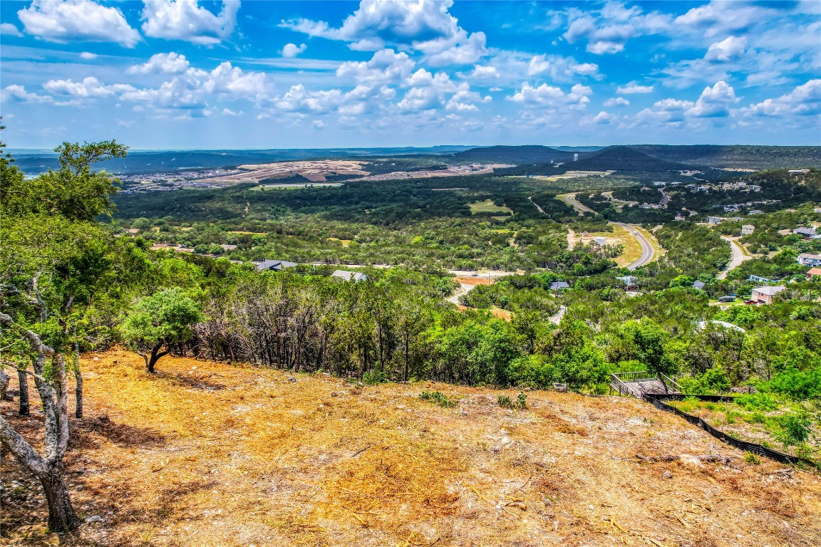 8224 Bar K Ranch Road Lago Vista, TX 78645 - Photo 2 of 23 a view of a yard with an outdoor space