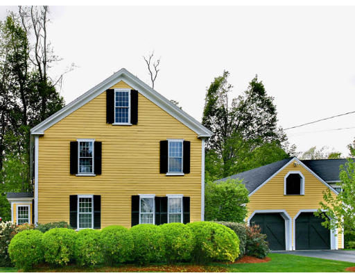 2 Parker Road Shirley, MA 01464 - Photo 3 of 15 a front view of a house with garden