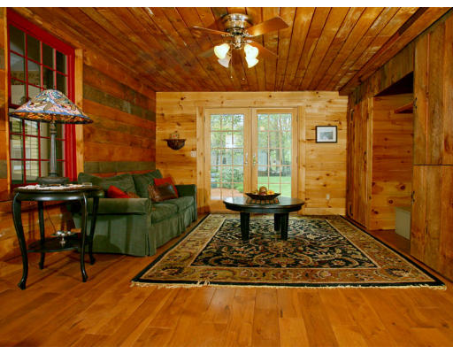 2 Parker Road Shirley, MA 01464 - Photo 9 of 15 a living room with furniture a rug and a table