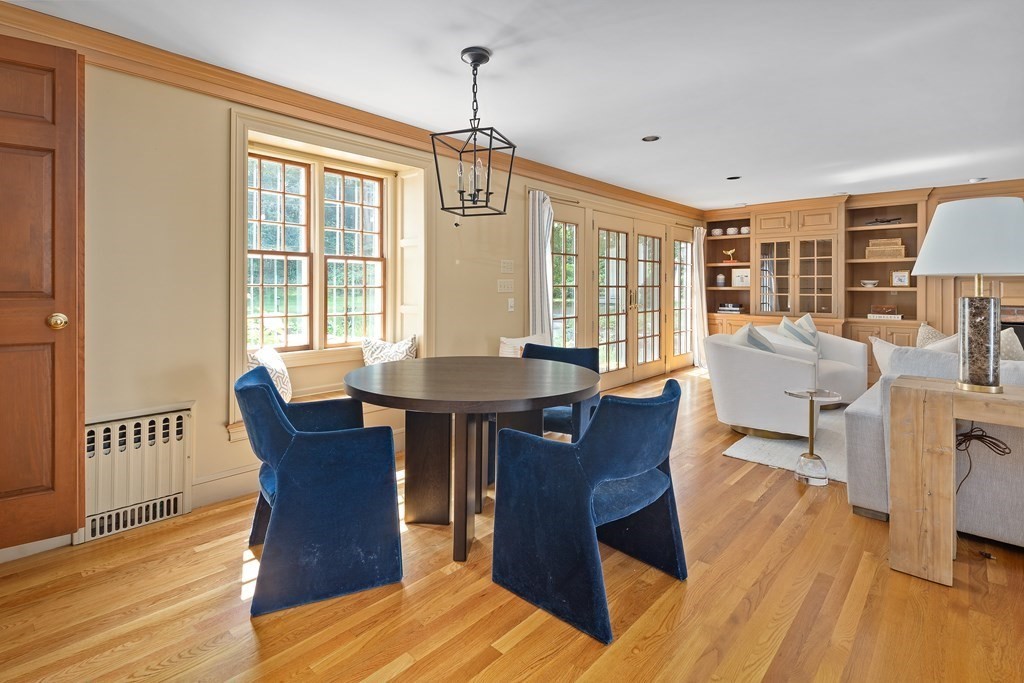 30 Arnold Road Hingham, MA 02043 - Photo 11 of 37 a view of a dining room with furniture window and wooden floor