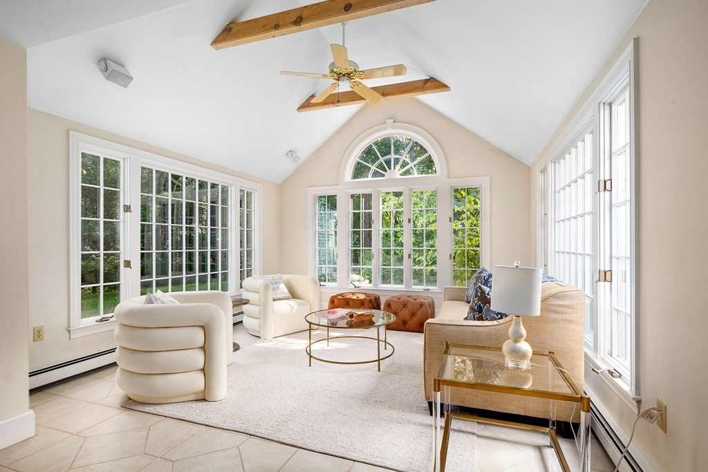 30 Arnold Road Hingham, MA 02043 - Photo 12 of 37 a living room with furniture and a large window