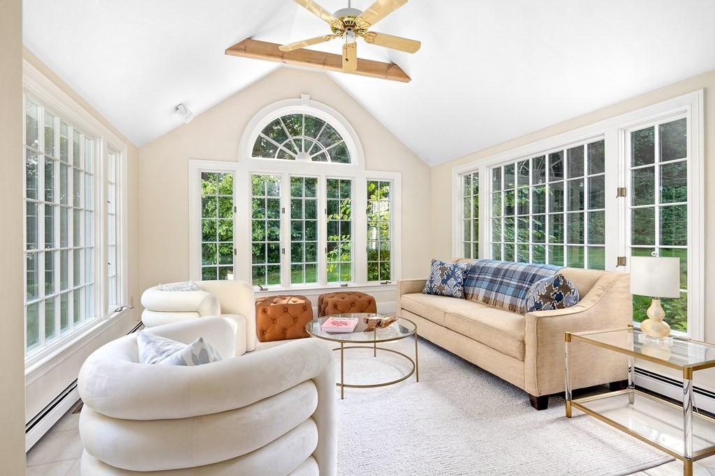 30 Arnold Road Hingham, MA 02043 - Photo 13 of 37 a living room with furniture and a large window