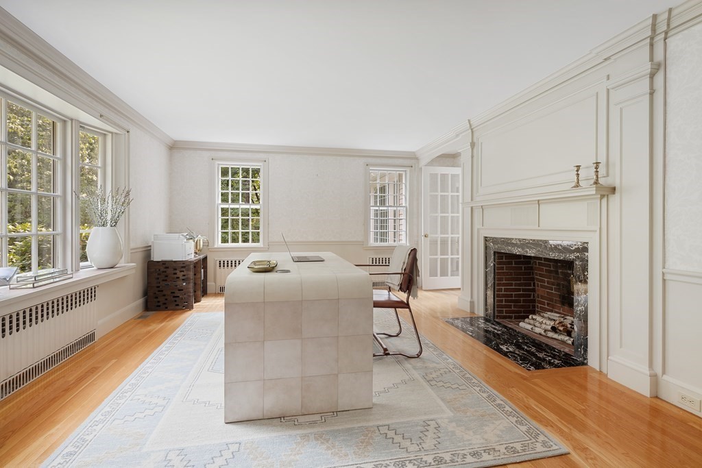 30 Arnold Road Hingham, MA 02043 - Photo 16 of 37 a living room with furniture and a fireplace