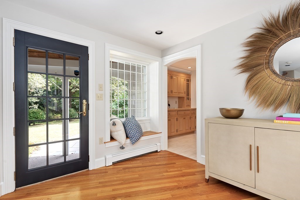 30 Arnold Road Hingham, MA 02043 - Photo 18 of 37 a living room with furniture and a large window