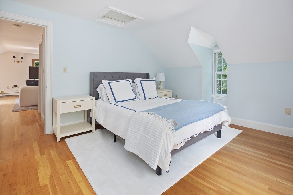 30 Arnold Road Hingham, MA 02043 - Photo 21 of 37 a bedroom with a bed and a dresser