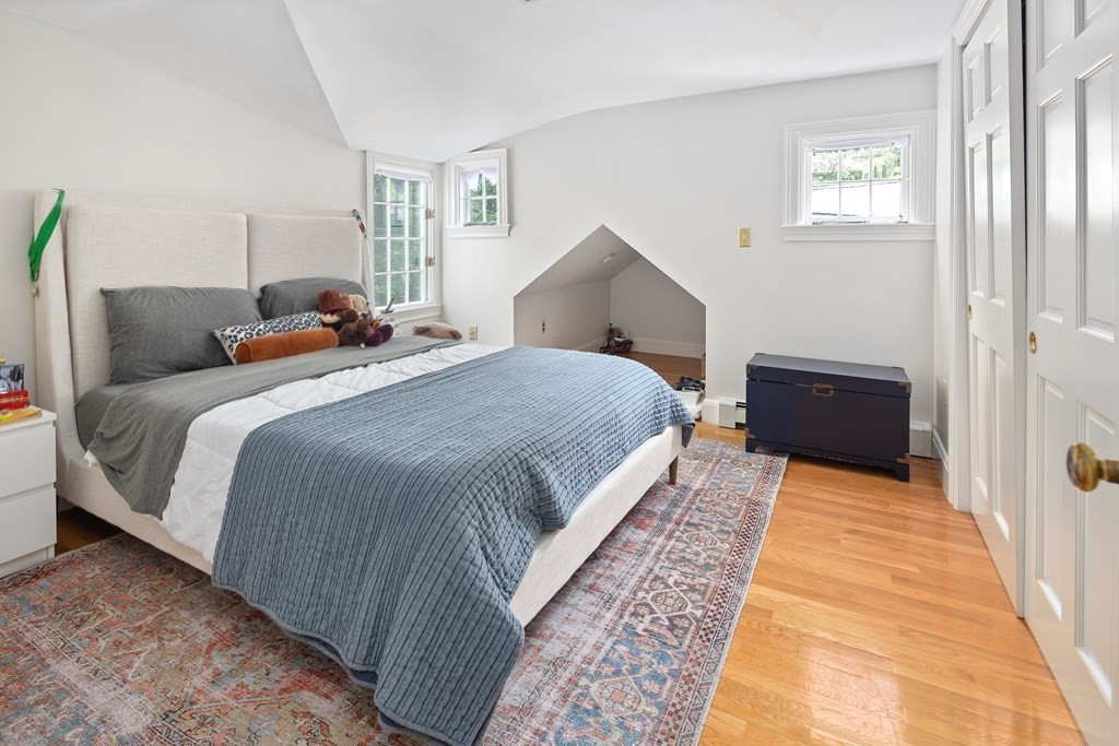 30 Arnold Road Hingham, MA 02043 - Photo 22 of 37 a bedroom with a bed and window