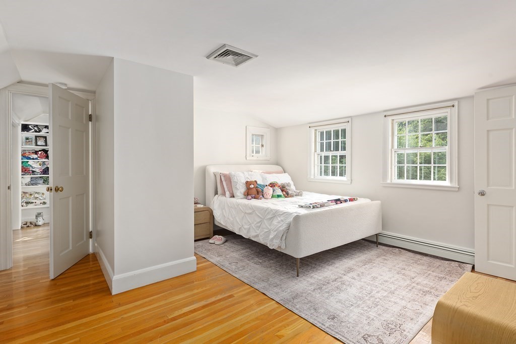 30 Arnold Road Hingham, MA 02043 - Photo 23 of 37 a bedroom with a bed and a window