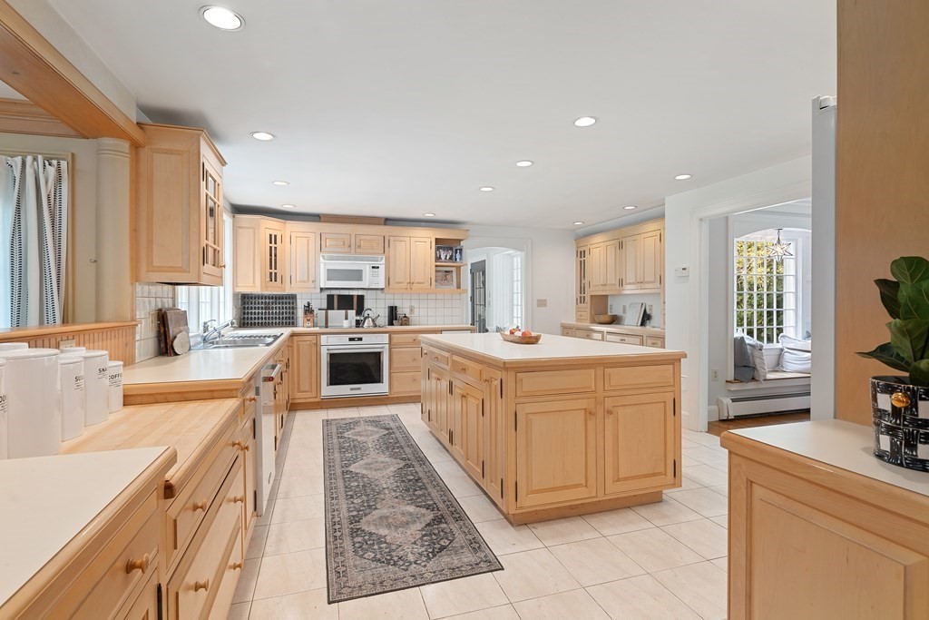 30 Arnold Road Hingham, MA 02043 - Photo 3 of 37 a large kitchen with stainless steel appliances lots of counter top space