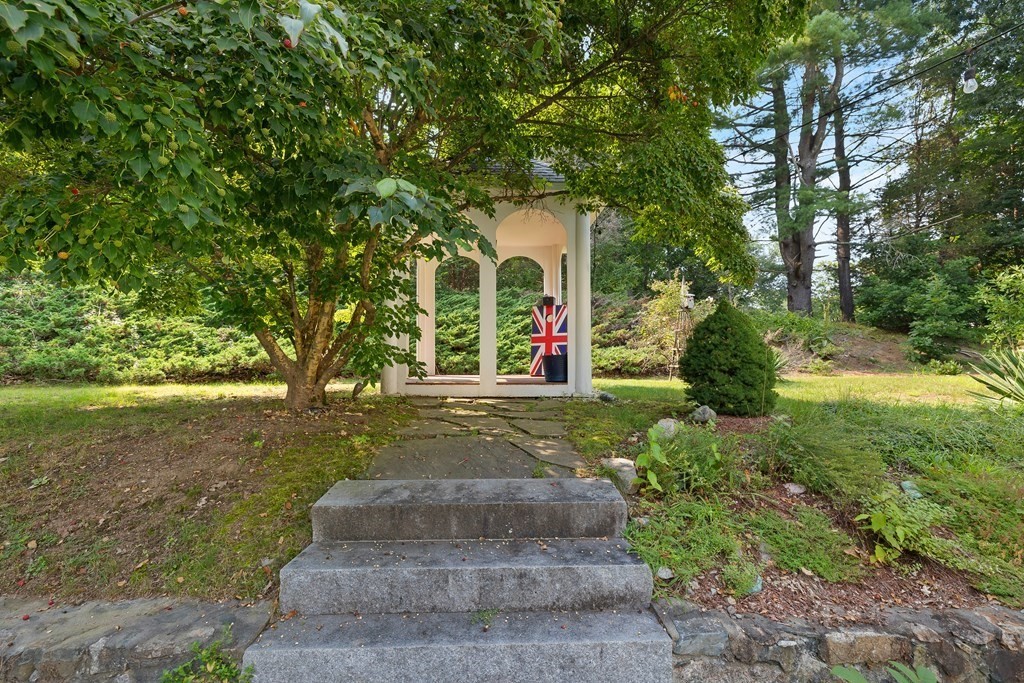 30 Arnold Road Hingham, MA 02043 - Photo 31 of 37 a front view of a house with garden