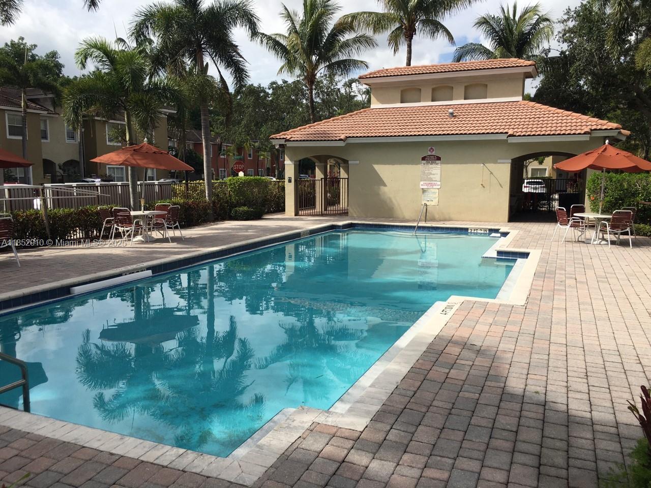 3361 Merrick Lane, Unit 808 Margate, FL 33063 - Photo 13 of 13 a view of a house with pool