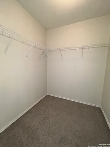 a bathroom with a bathtub and a sink