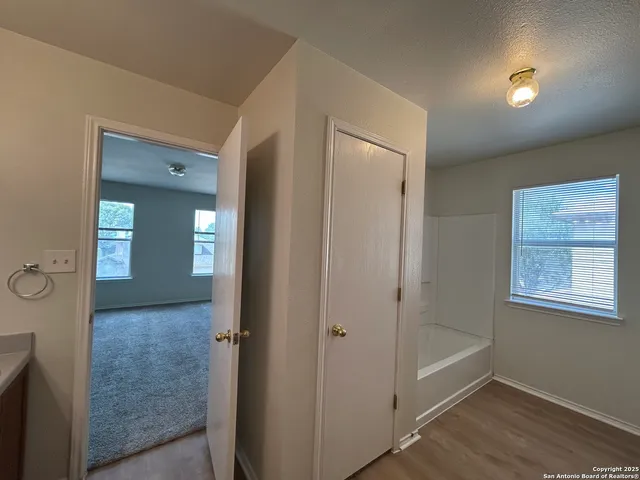 a view of bathroom with a bathtub