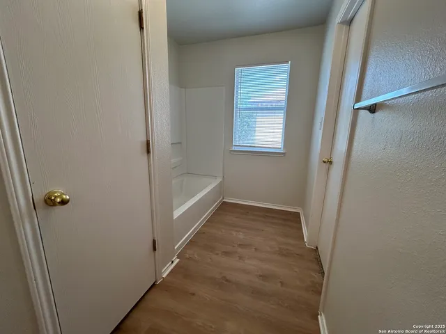 a view of a room with racks on the wall