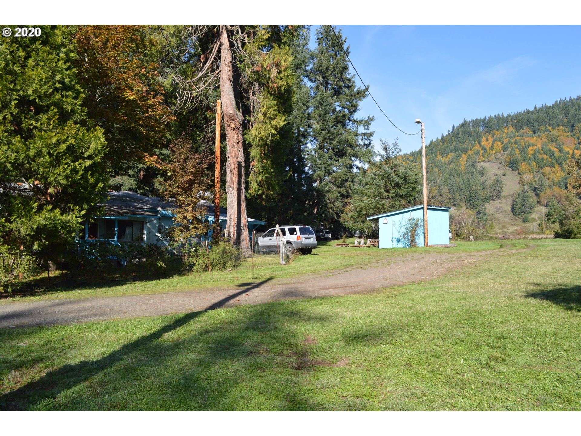 38181 Row River Road Dorena, OR 97434 - Photo 14 of 24 a view of a back yard