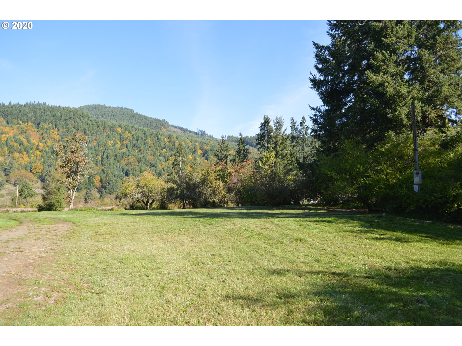 38181 Row River Road Dorena, OR 97434 - Photo 16 of 24 a view of a field with an ocean